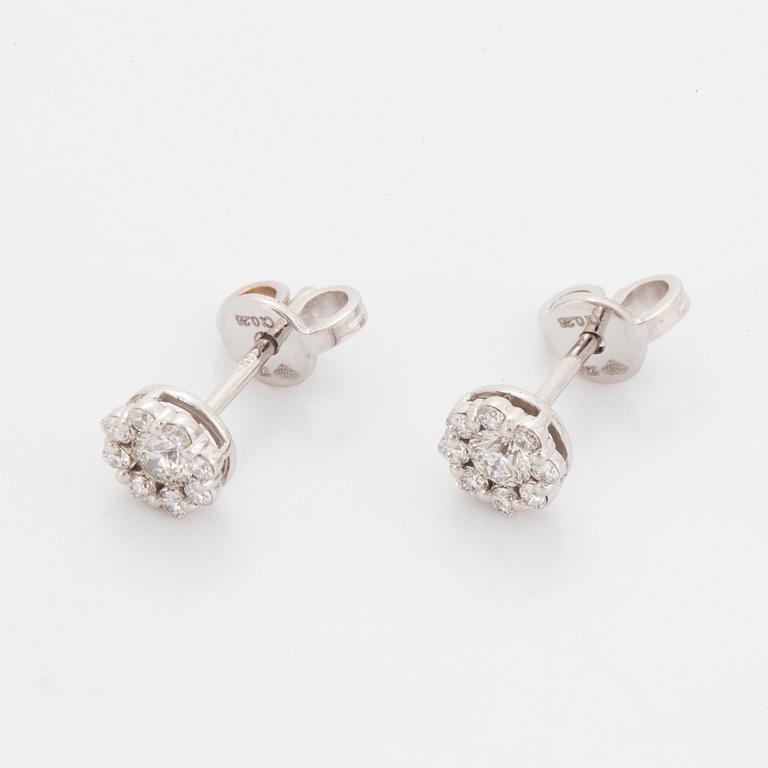 Brilliant-cut diamond earrings.