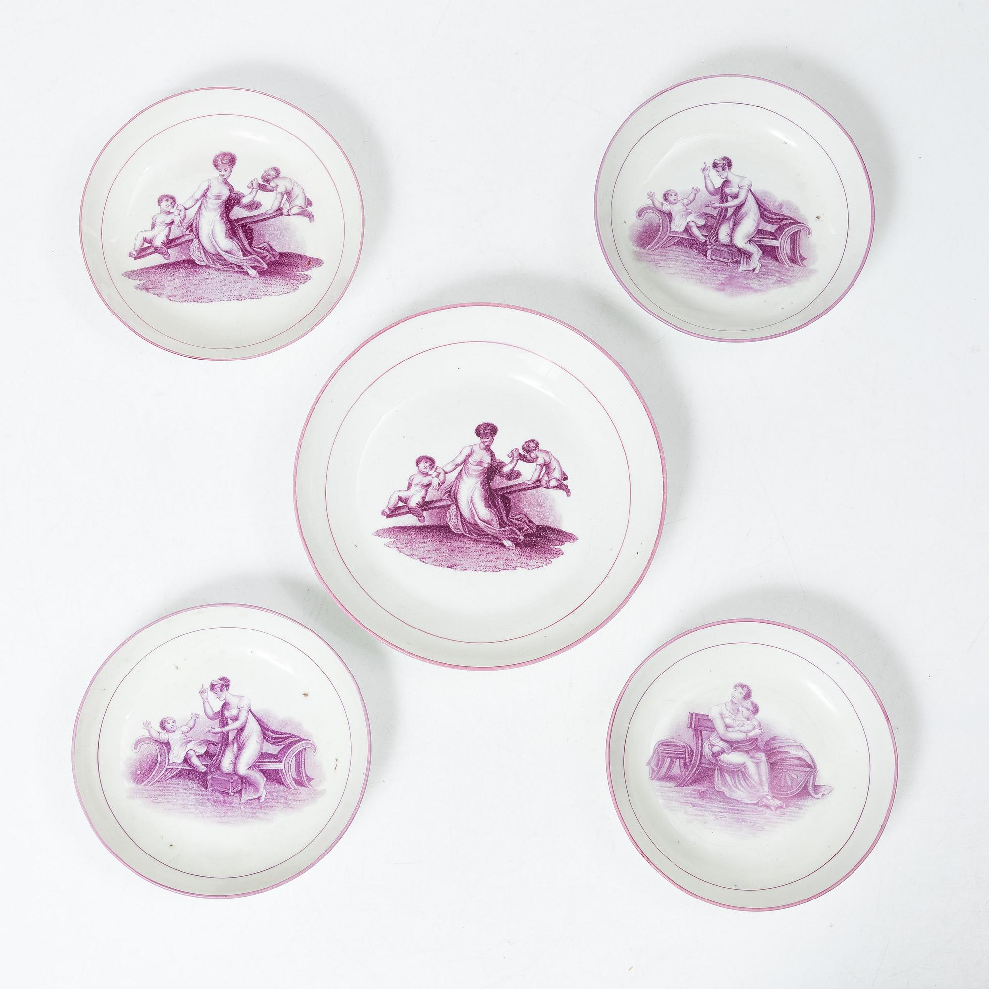 A purple camaieu part coffee service, Early 19th century.