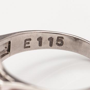 A platinum ring with a ca. 1.15 ct emerald and ca. 1.00 cts of diamonds in total.