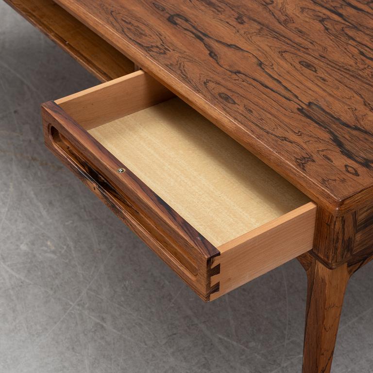 A 1960's rosewood coffee table.