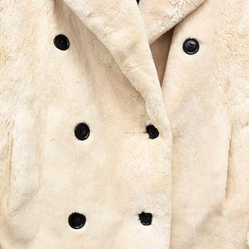 YVES SAINT LAURENT, a fur coat, size ca medium.
