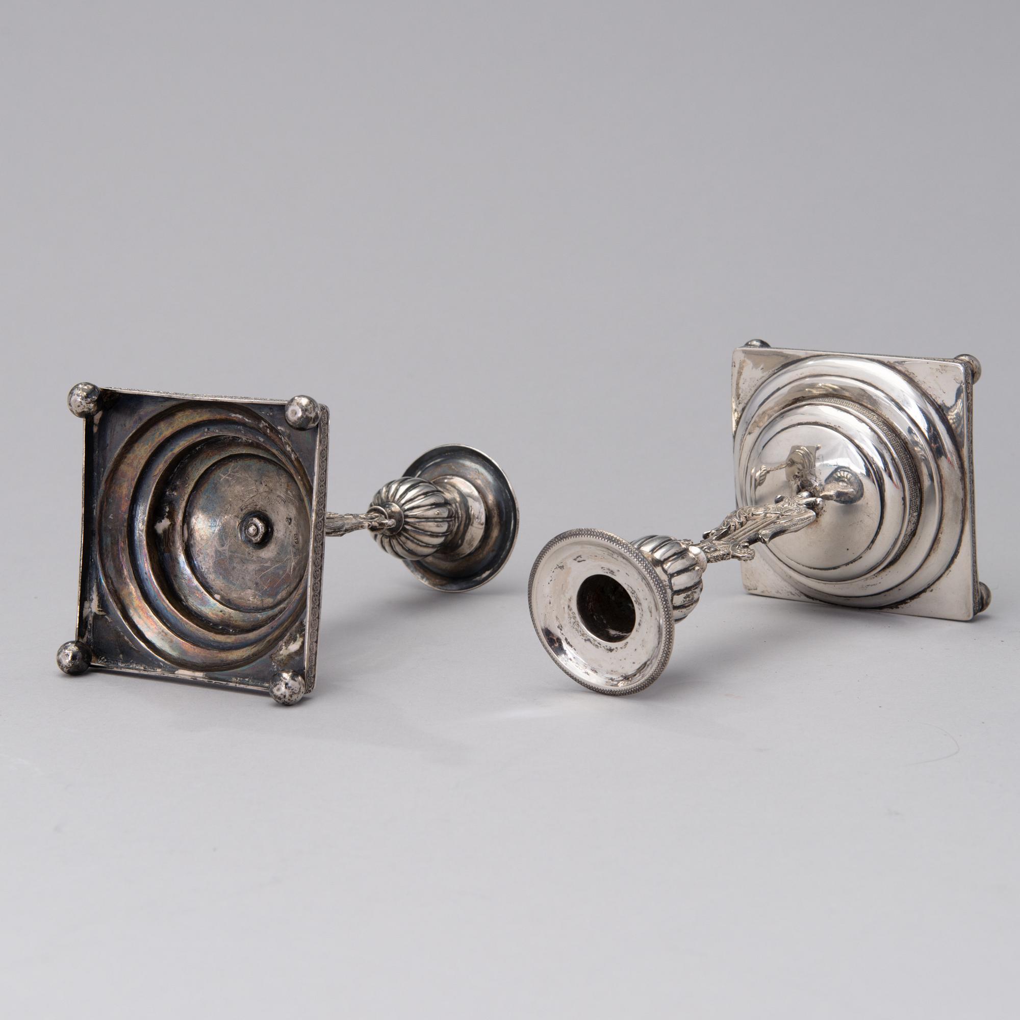 A PAIR OF FINNISH SILVER CANDLESTICKS, Wilhelm Fahlström 1818-1828, Helsinki.