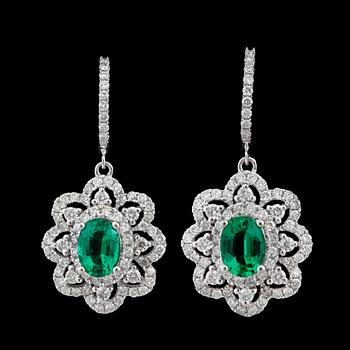 1096. A pair of emerald, 1.54 cts, and brilliant 1.37 cts, earrings.