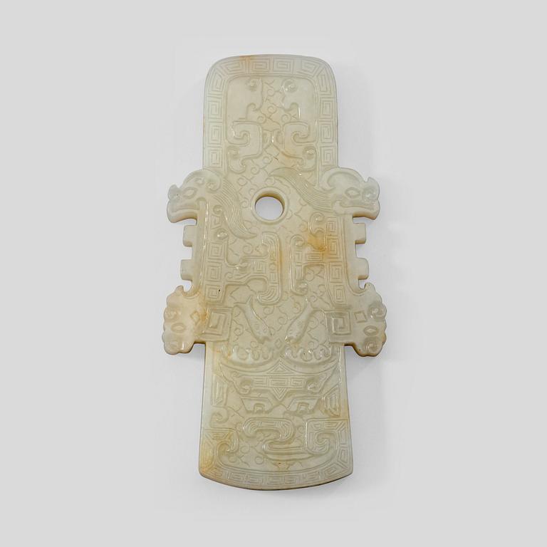 An archaistic nephrite plaque, China.