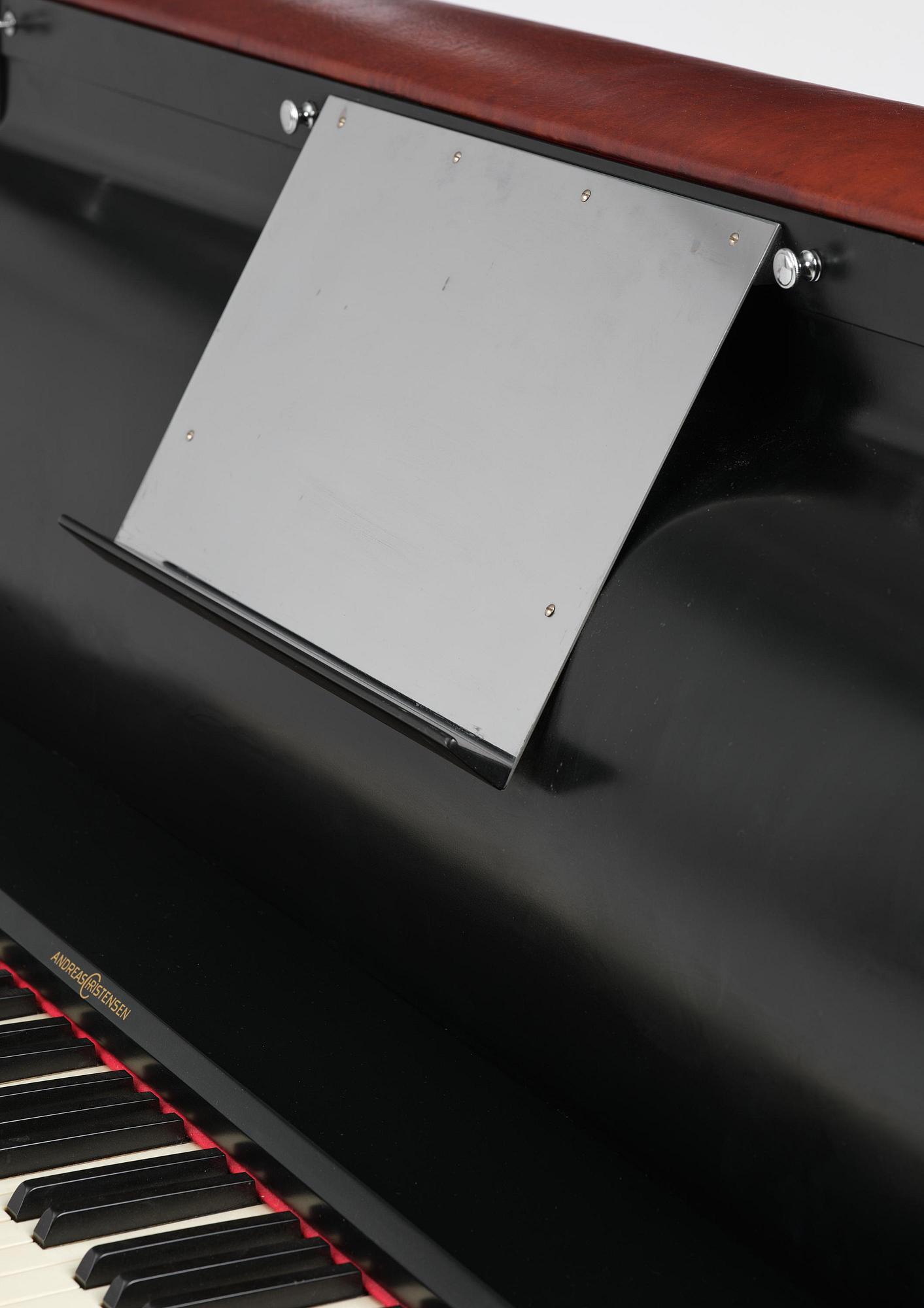 Poul Henningsen, a "PH Upright Piano", executed by Andreas Christensen, Denmark, 1940s.