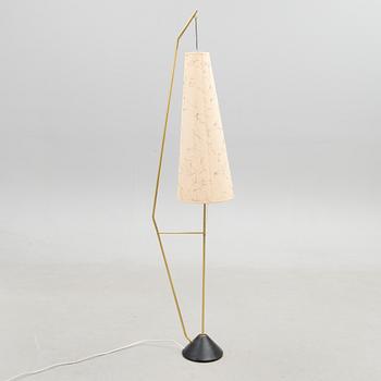 A mid-20th Century floor lamp.