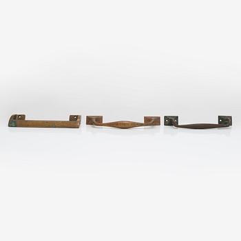 Door handles, three pieces, ca 1900 and 1960s.