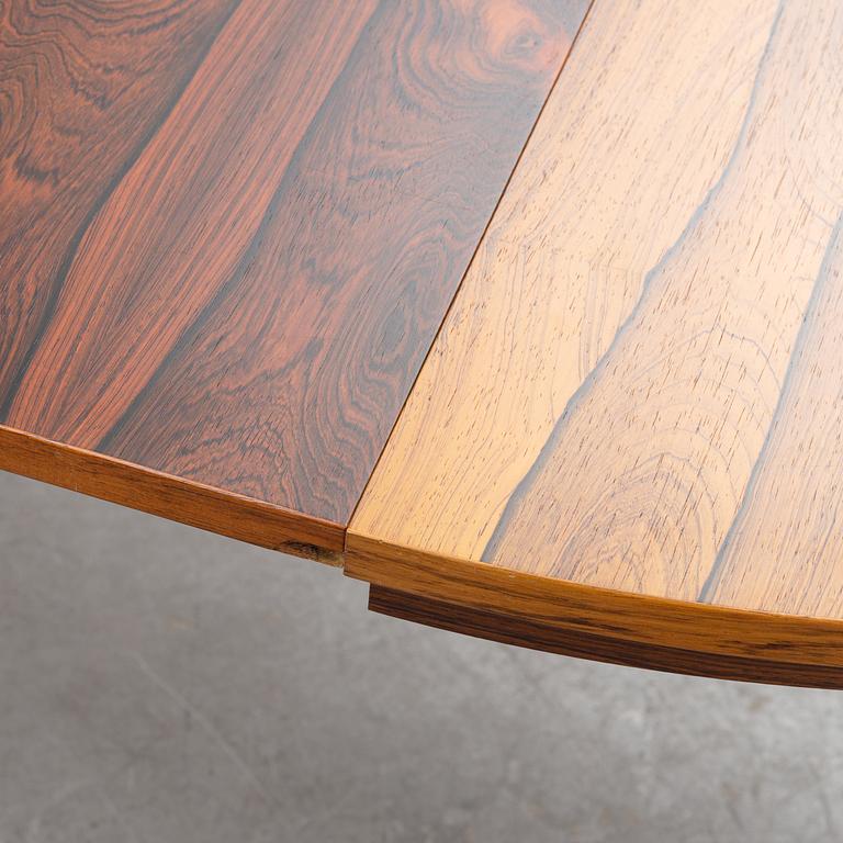 A rosewood dining table, 1970's.