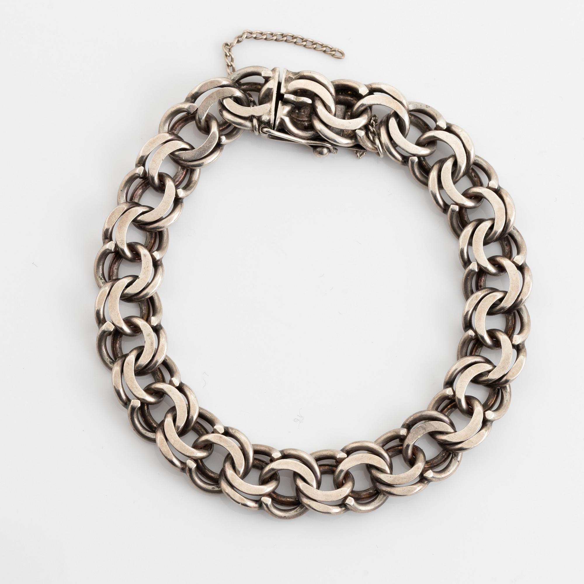 Silver bracelet.