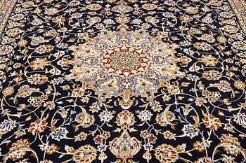 A Kashan carpet, c. 413 x 308 cm.