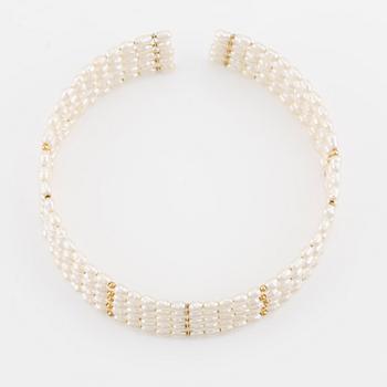 Five-row collar/choker with cultured freshwater pearls and 14K gold beads.