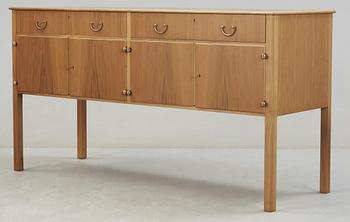 A Josef Frank walnut sideboard with a burrwood top, Svenskt Tenn.