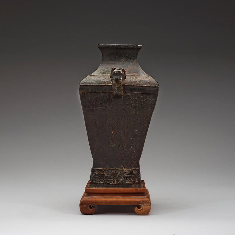 An archaistic bronze beaker vase.