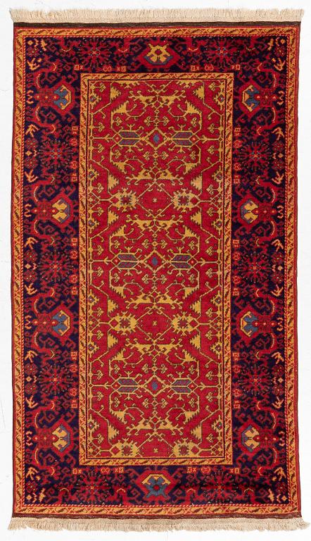A semi antique Romanian "Lotto" rug, c. 214 x 123 cm.