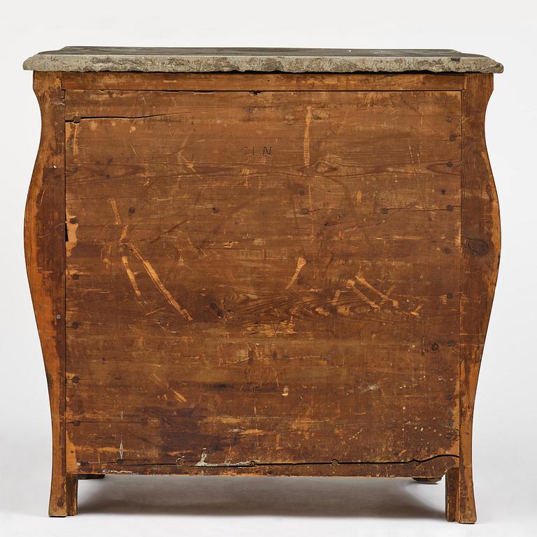 A rococo parquetry commode by C. Linning (master in Stockholm 1744-79).