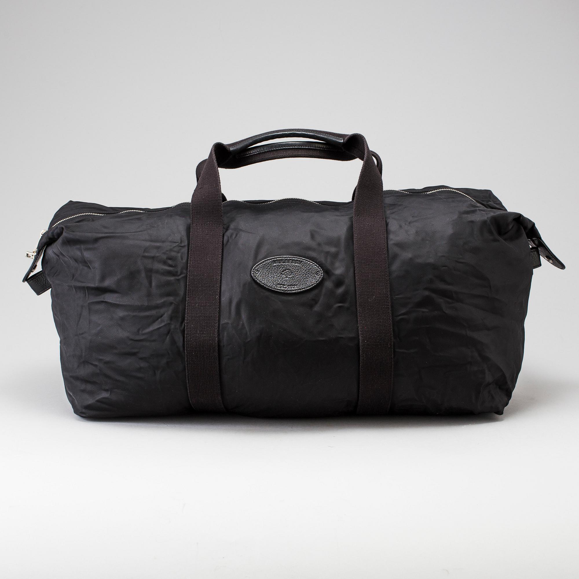 A foldable Mulberry weekend bag.