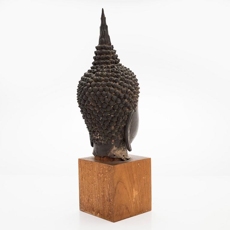 A patinated metal sculpture from Thailand, 20th century.