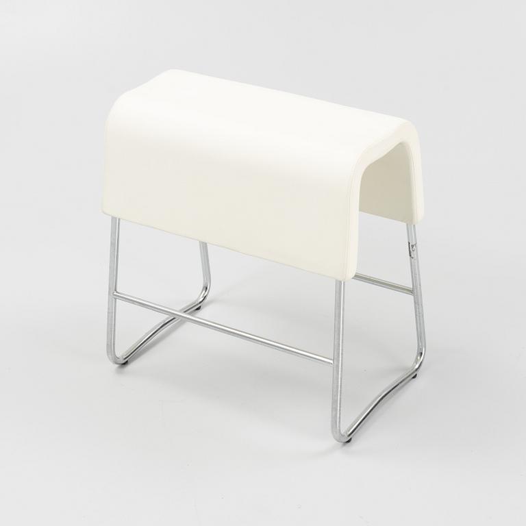 A leather upholstered stool by Sandin och Bülow for Materia 2001.