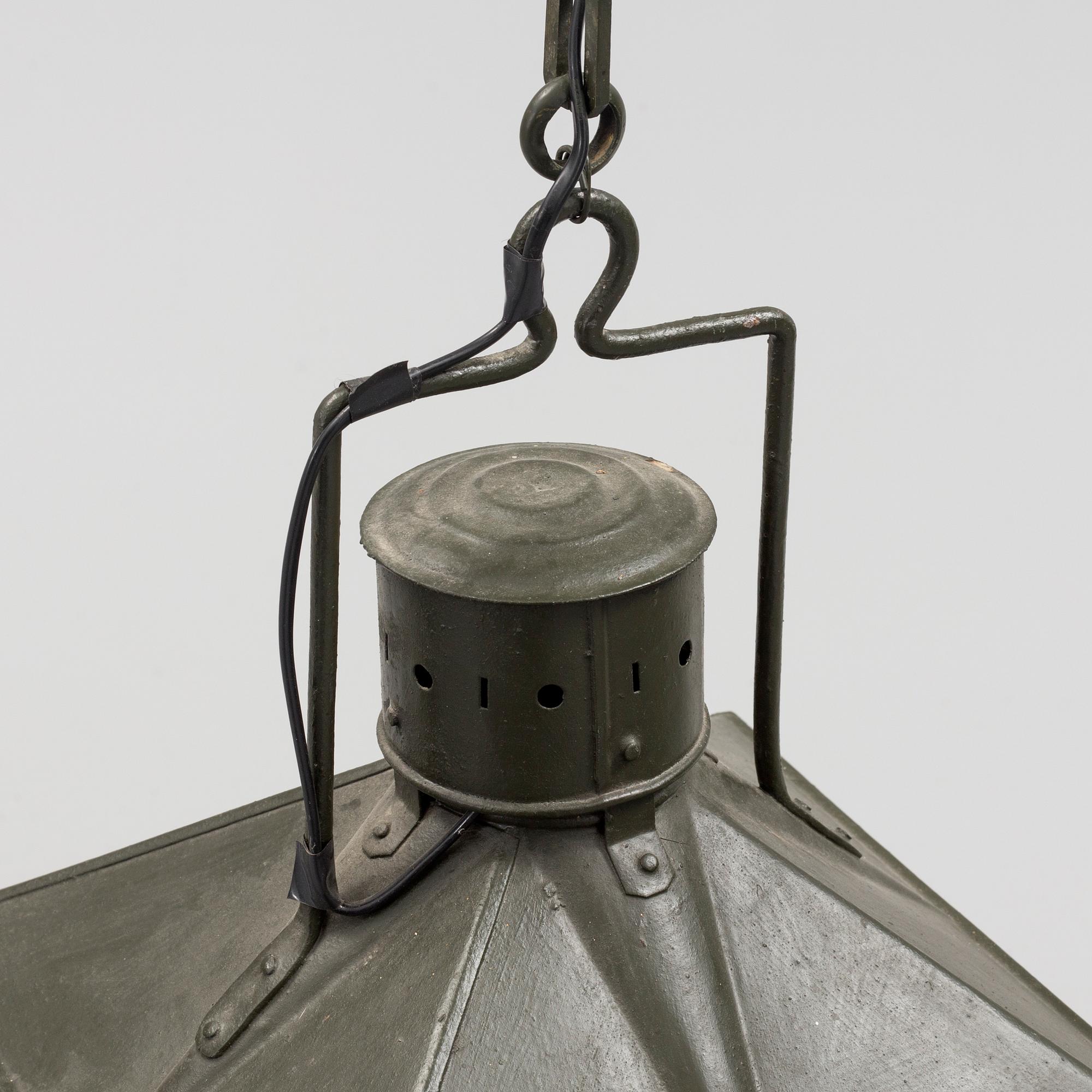 A first half of the 20th century ceiling light. Heigt ca 65 cm.