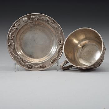 An export silver cup and saucer, probably Shanghai, early 20th century.