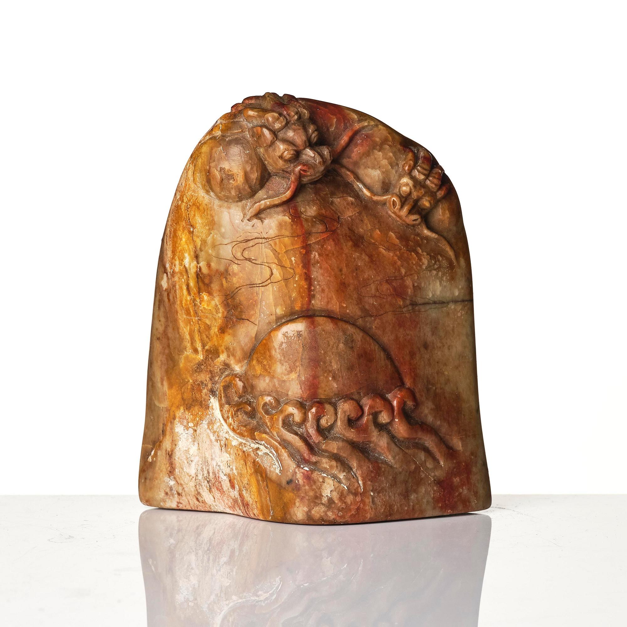 A group of carved nephrite and jade ornaments, China, Qing dynasty and older. (8 pieces).