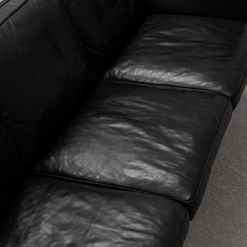An 'AV59' sofa by Arne Vodder, Nielaus, Denmark.