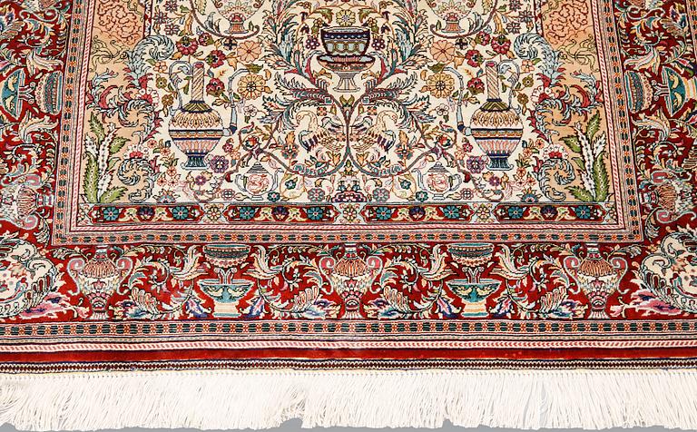 A oriental silk rug, 155 x 93 cm.