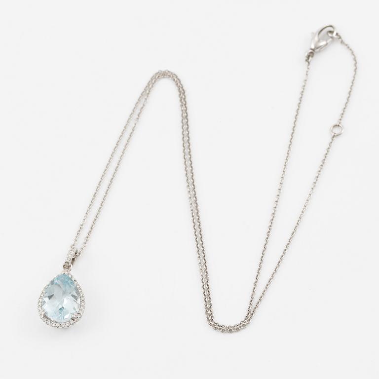 Pendant with chain in 18K white gold set with a faceted aquamarine and round brilliant-cut diamonds.