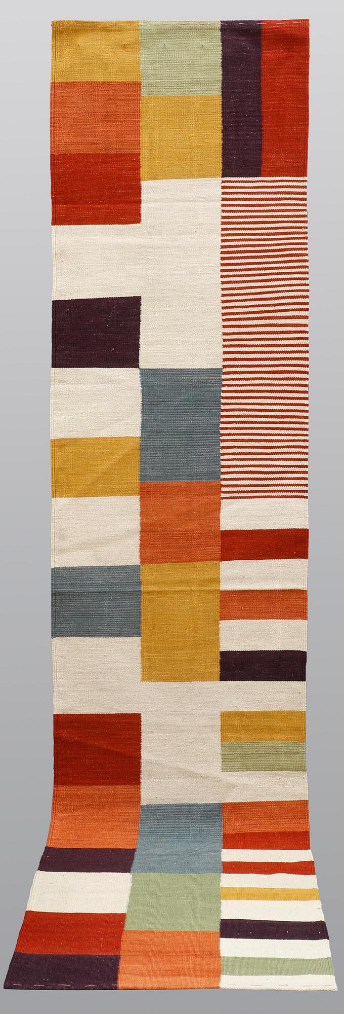 A runner, flat weave, ca 344 x 77 cm.