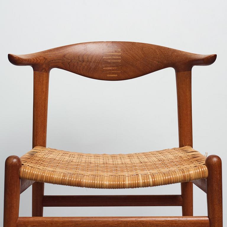 Hans J. Wegner, a set of six teak and rattan "Cowhorn Chairs" "JH-505", executed by cabinetmaker Johannes Hansen, Denmark 1950-60's.