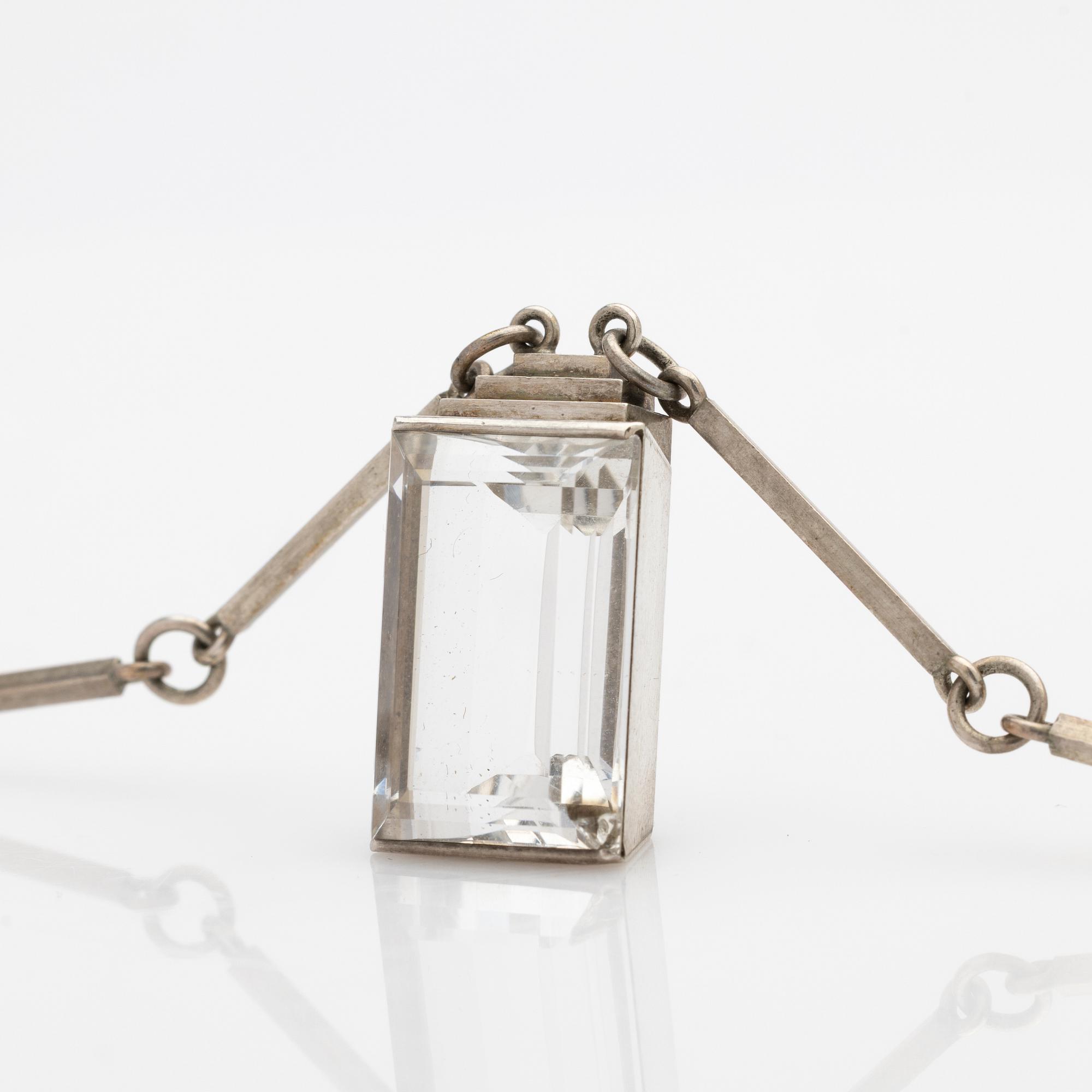 Wiwen Nilsson, Pendant, sterling silver with faceted rock crystal, Lund 1944.
