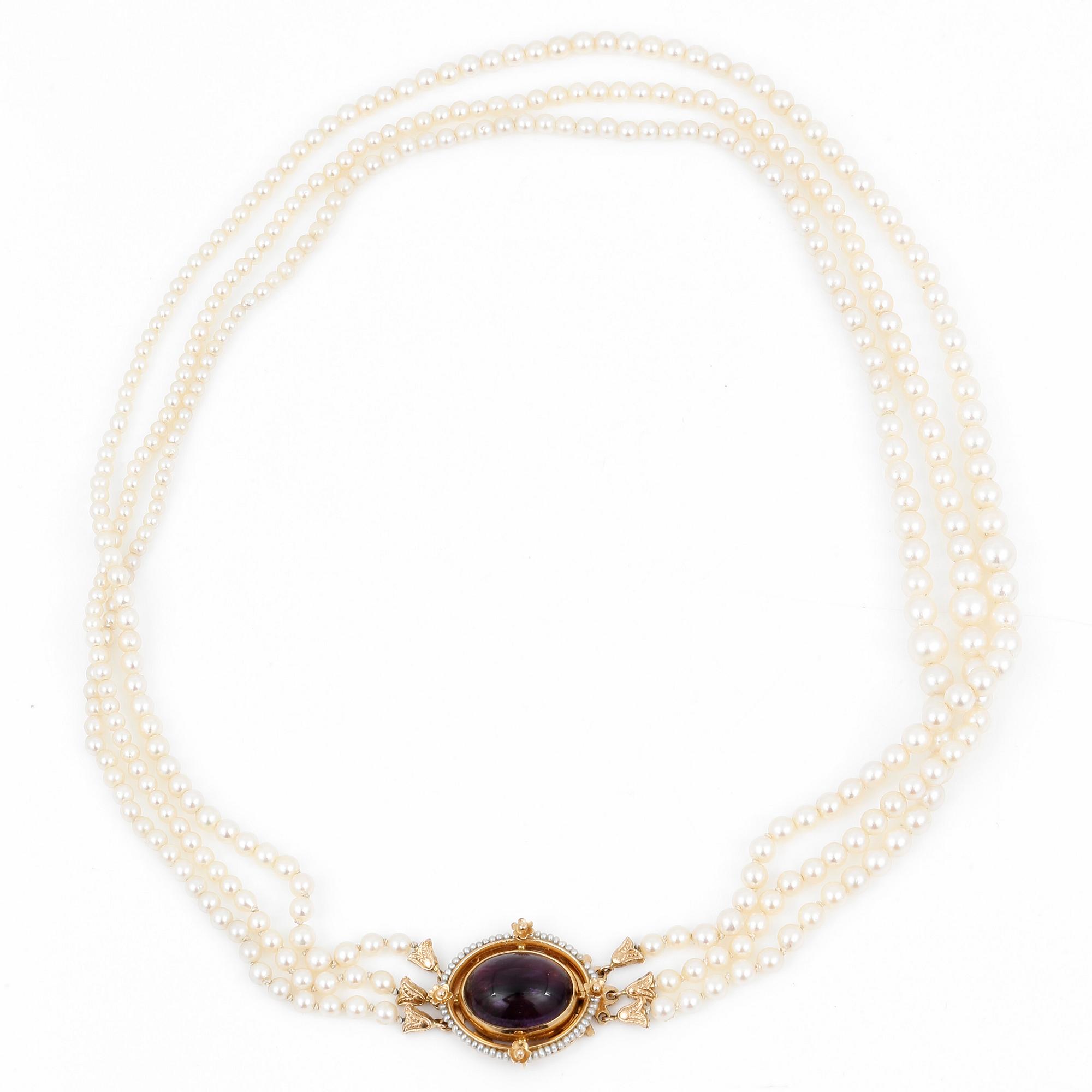 COLLIER, med odlade pärlor och cabochonslipad ametist, Stigbert, Stockholm, 1959.