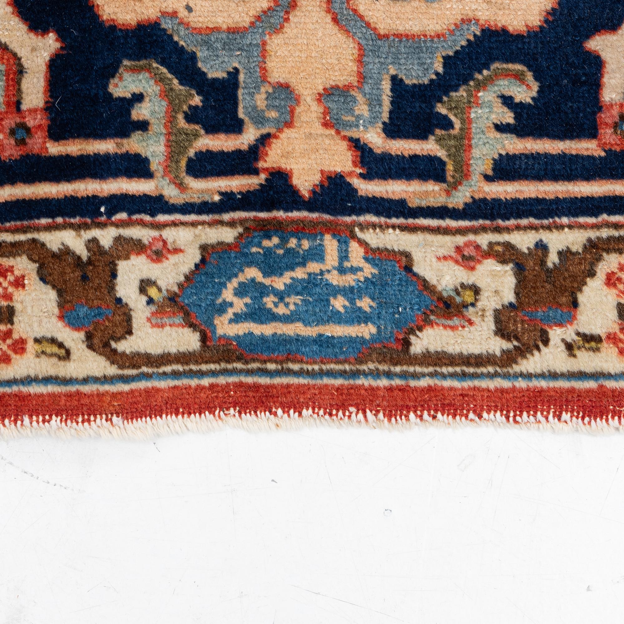 Semi-antique Tabriz rug, approx. 365 x 275 cm.