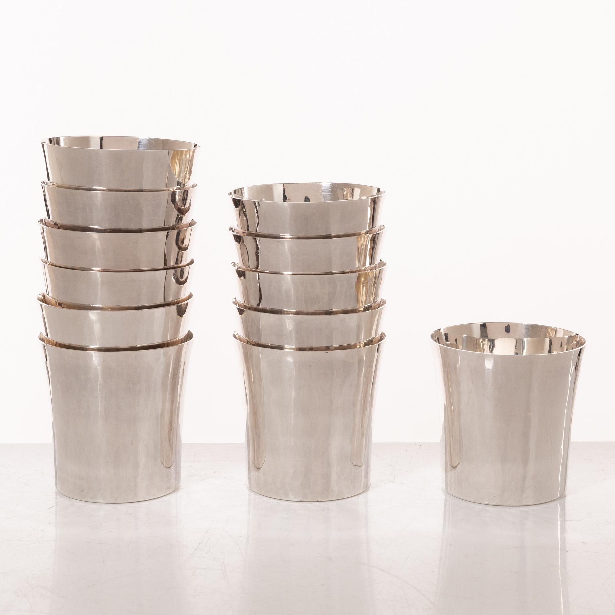 Eric Löfman, A set of twelve silver beakers, KG Markström, Uppsala 1975.