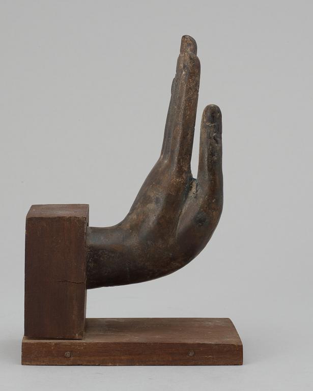 A  Thai bronze Buddha hand.