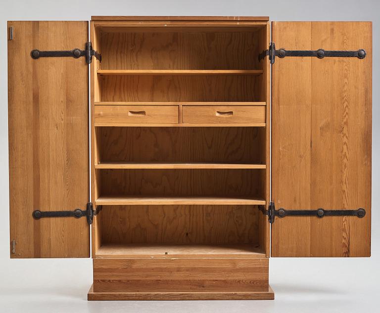 Axel Einar Hjorth, a stained pine cabinet "Lovö", Nordiska Kompaniet, Sweden 1930's.