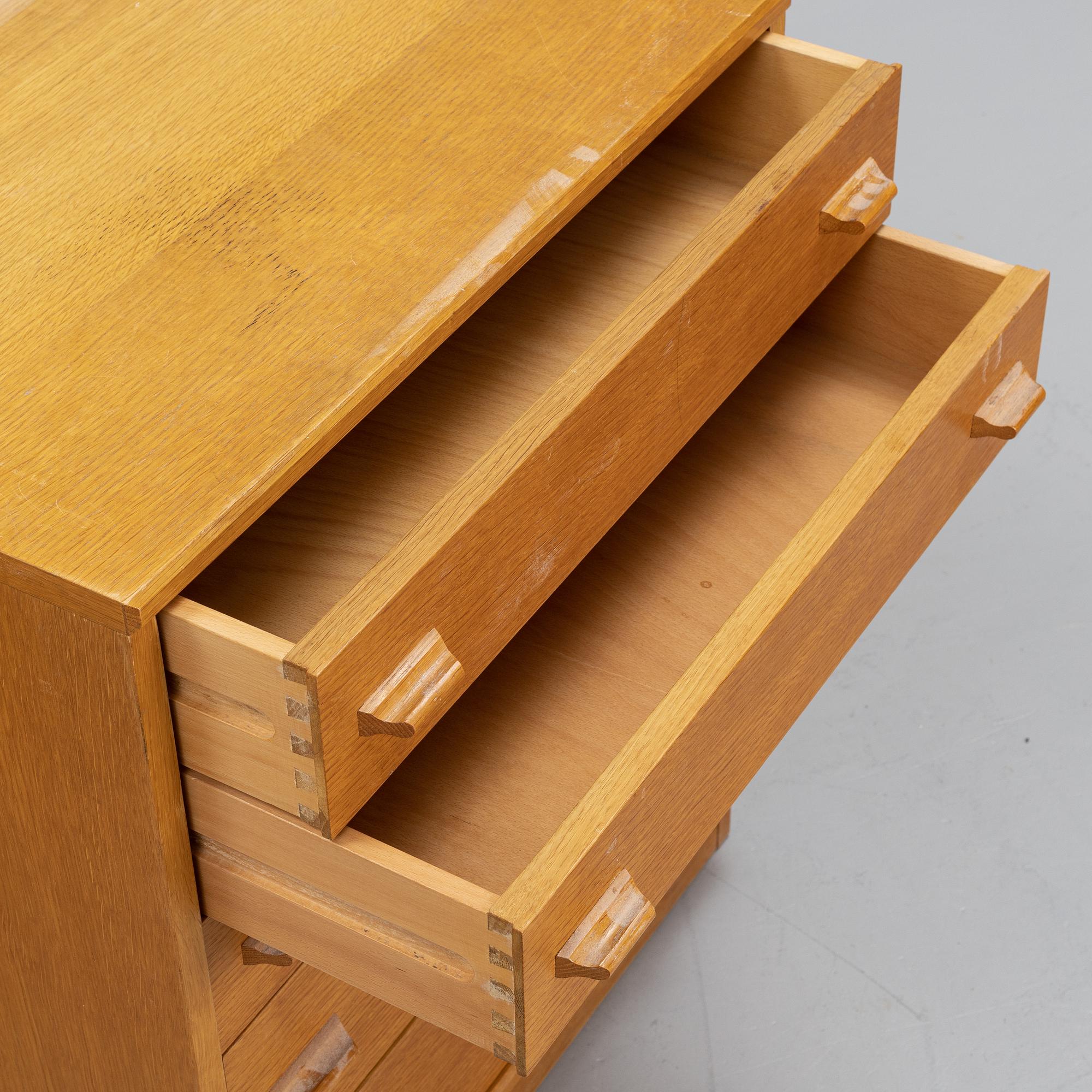 An oak veneered cabinet and chest of drawers, later part of the 20th Century.