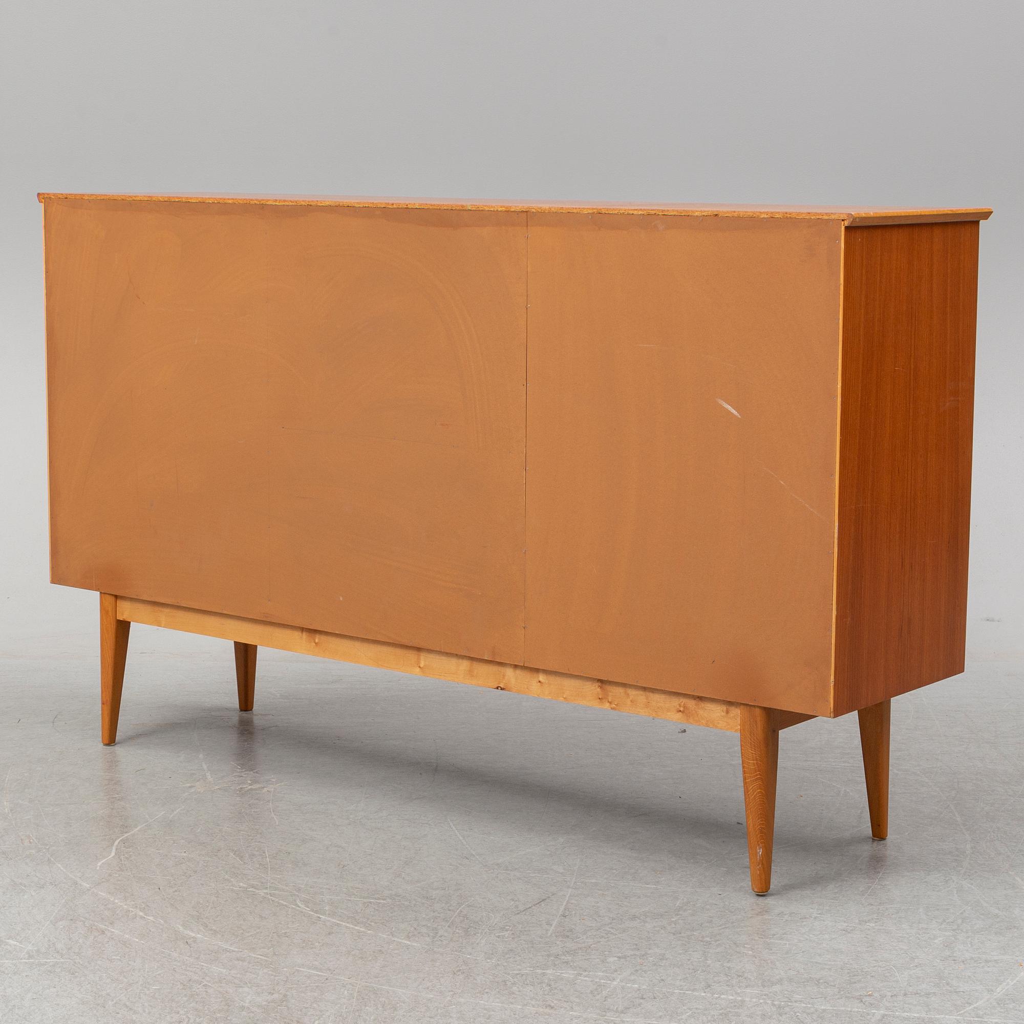 A mid 20th Century teak sideboard.