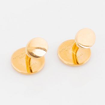 Patek Philippe, slipsnål och manschettknappar.