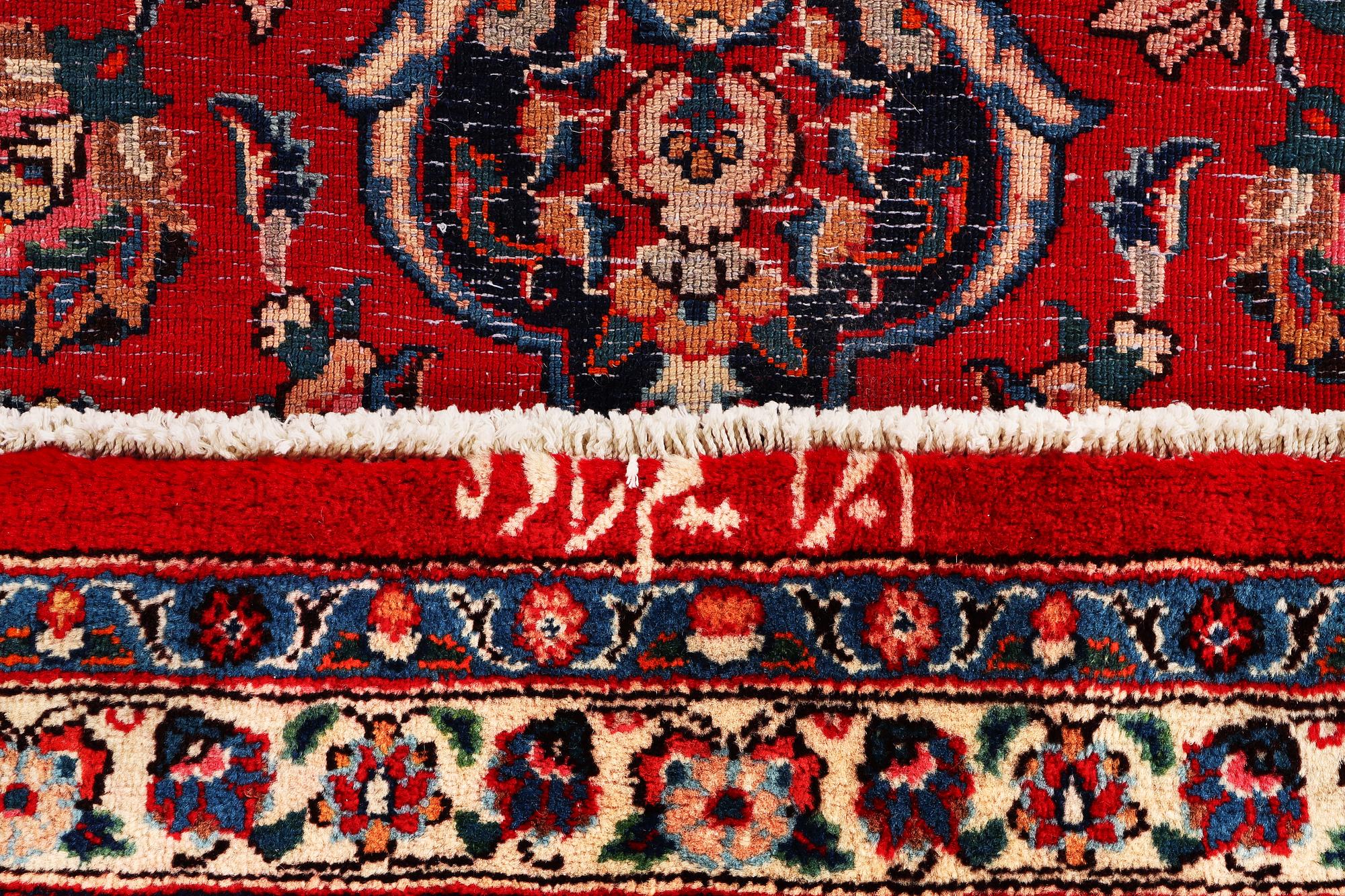 A Keshan carpet, c. 390 x 290 cm.