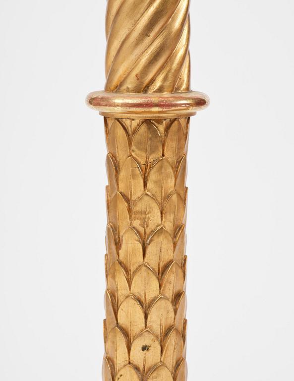 A pair of late Gustavian giltwood torchères by J. Frisk (master in Stockholm 1805-24).