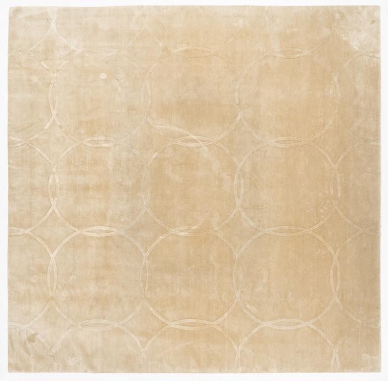 A carpet 360 x 360 cm.