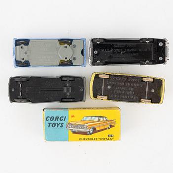 Nine toy cars, mostly Dinky toys.