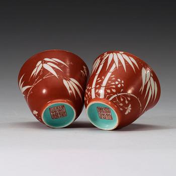 A pair of coral-red ground "Bamboo" cups, Qing dynasty, 19th Century.
