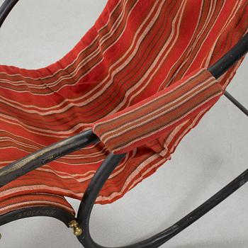 A 19th century rocking chair, probably Robert W. Winfield.