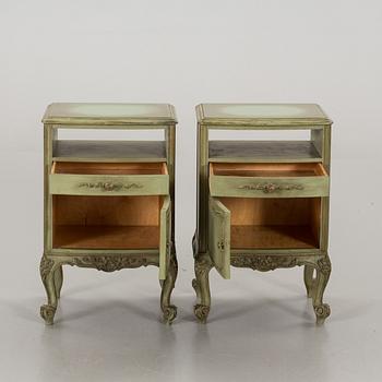 A PAIR OF BEDSIDE TABLES.