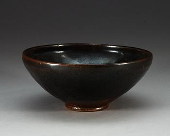 A brown and black glazed bowl, Song dynasty (960-1279).