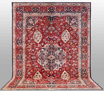 A CARPET, Tabriz, possibly, part silk, ca 417 x 300 cm.