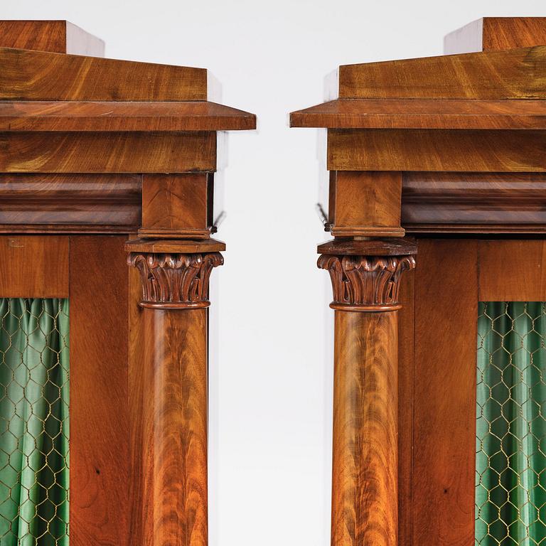 A pair of Swedish Empire mahogany bibliothèques, Stockholm, early 18th century.