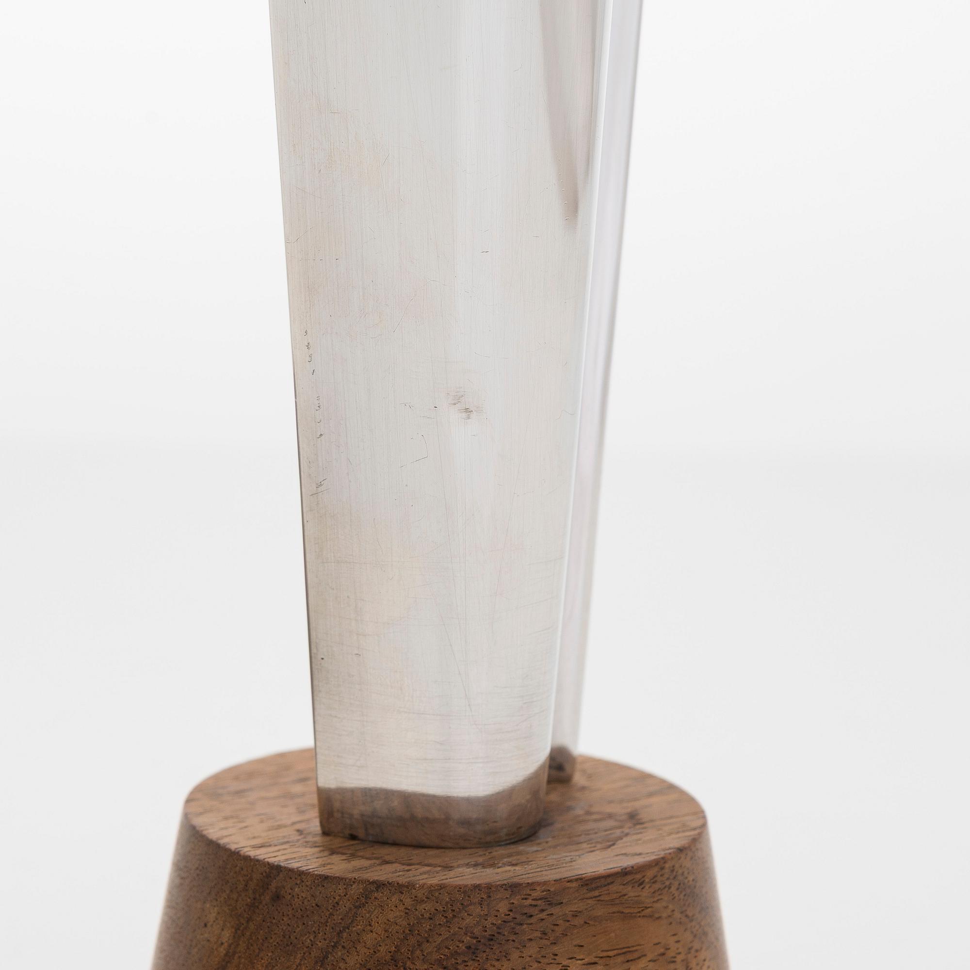 Tapio Wirkkala, two silver and teak 'Flame' vases, Kultakeskus, Hämeenlinna 1962 and 1964.